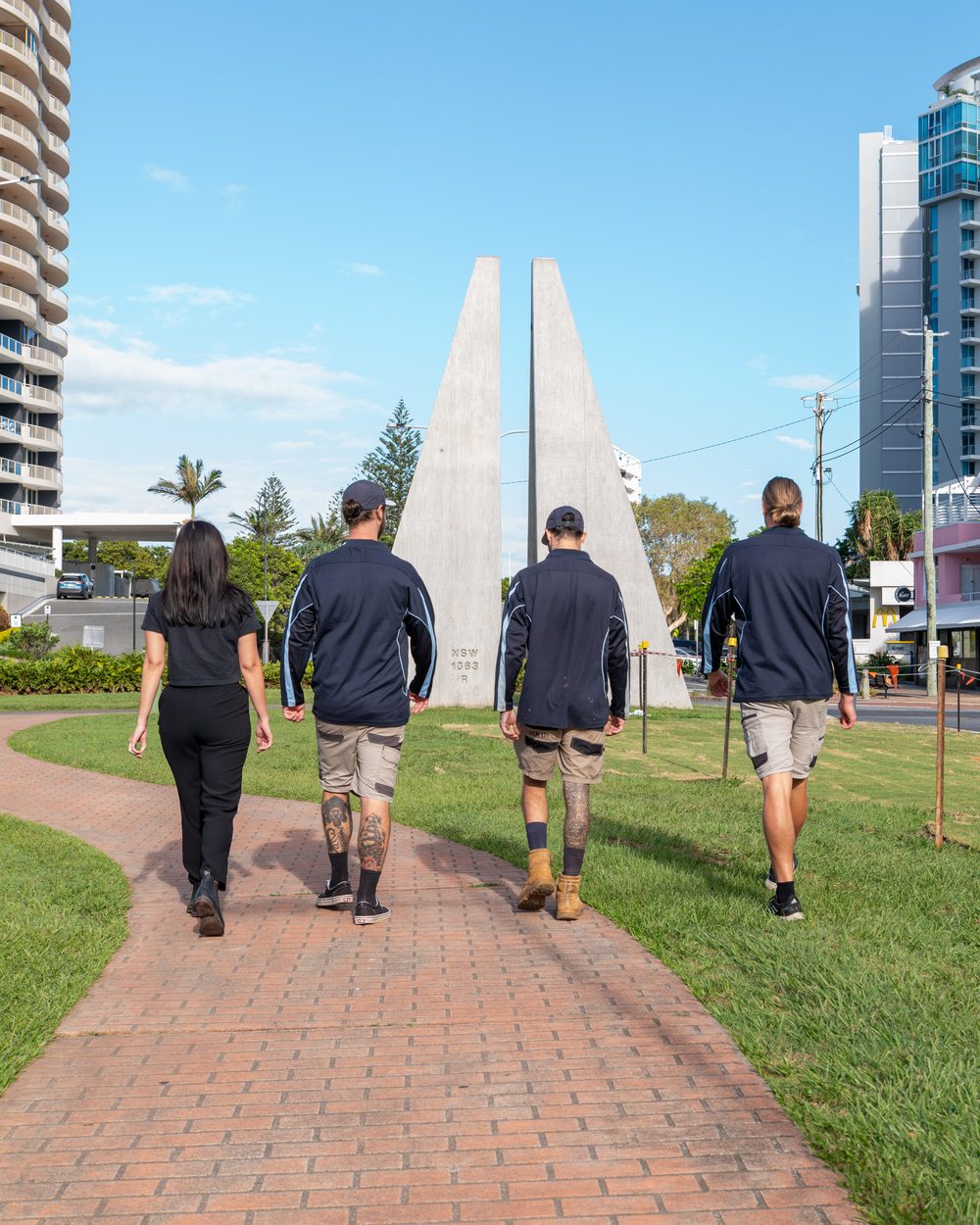 Cooly plumbers walking to the job