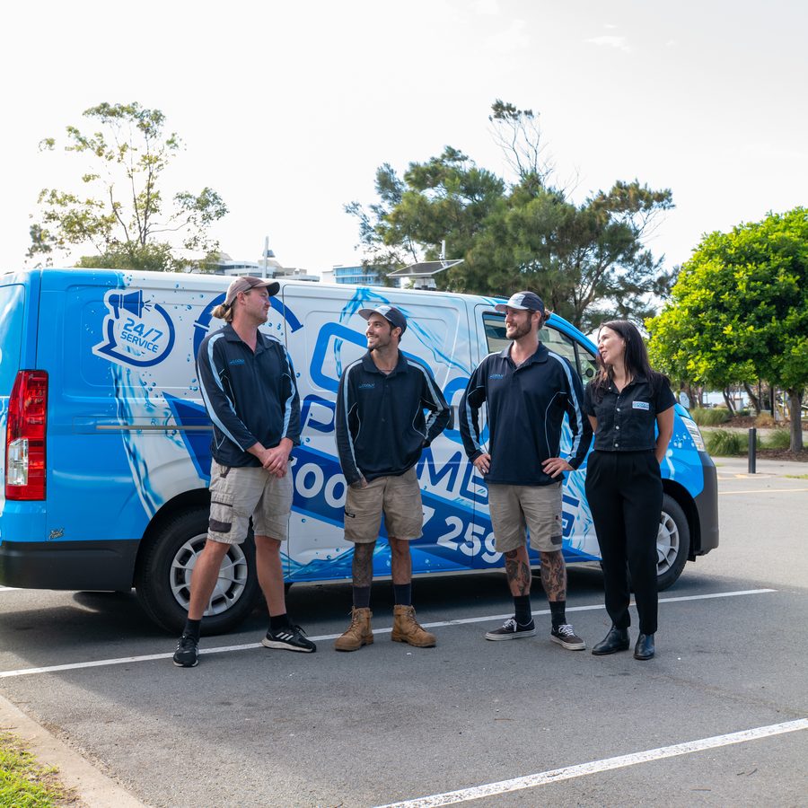 The Cooly Plumbing team in front of their van