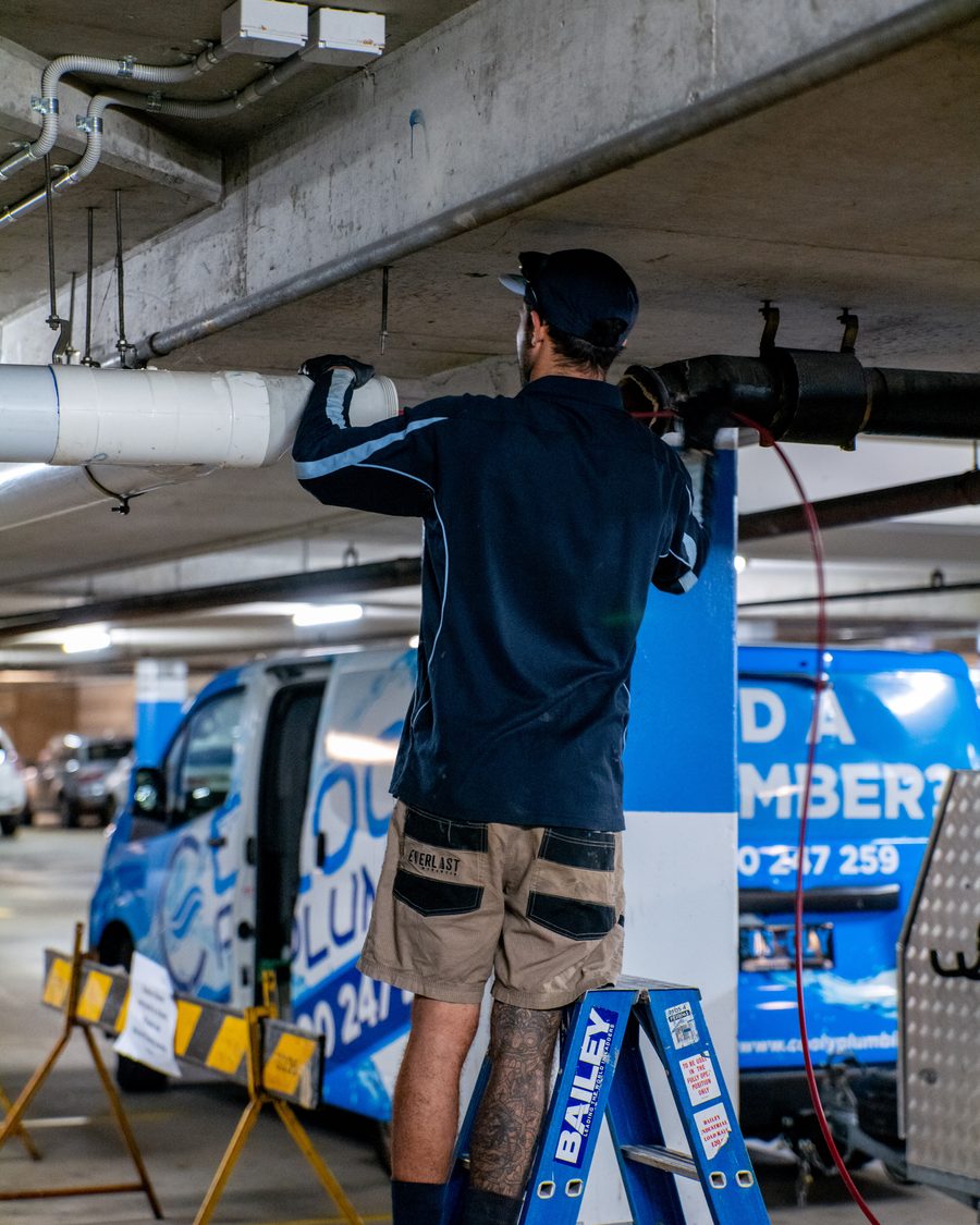 Working on overhead pipework